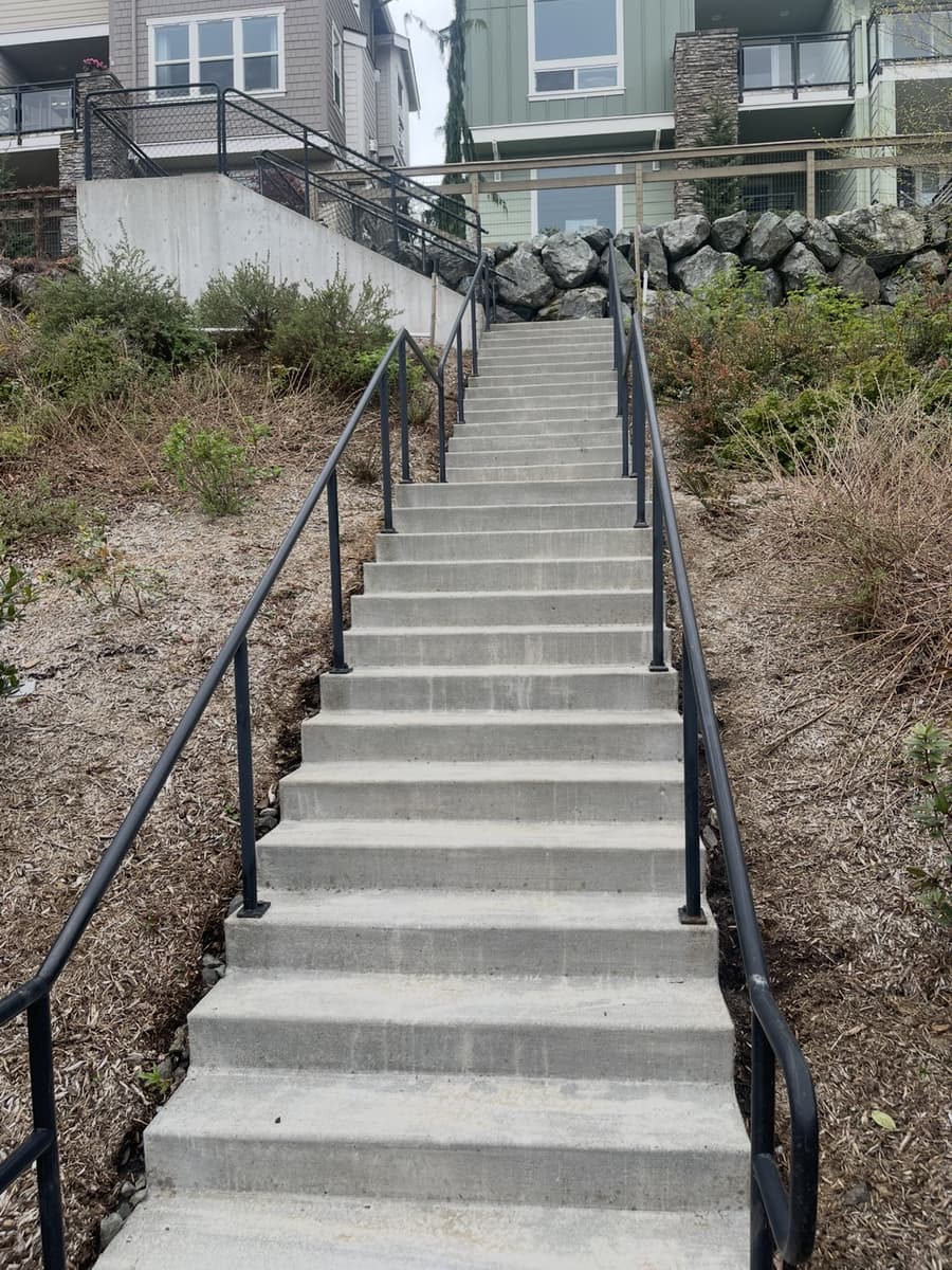 Clean concrete stairway at an apartment complex